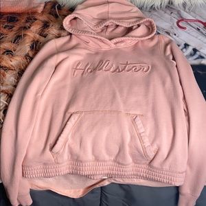 This is a blush pink hoodie from hollister